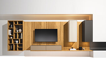Eine elegante Wohnwand in warmem Eichenholz-Finish. Die klaren Linien und das stilvolle Design bieten reichlich Stauraum und einen Hauch von rustikalem Charme. Team 7 Cubus Pure